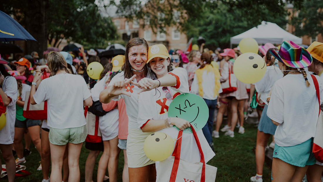 Girls celebrating their new sorority chapter on Bid Day
